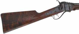 Freund's Improved 1874 Sharps Sporting Rifle
.40-70 Sharps straight, 30" tapered octagon barrel,
figured walnut, engraved, double set triggers,
used, by Schuetzen Gun Company