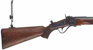 1877 New Model Sharps
No. 1 Creedmoor Long Range Rifle,
.45-90 Sharps, 34" Rigby flat barrel,
checkered walnut, fitted with 9A long range tang sight, 
used, by Axtell Rifle Co.