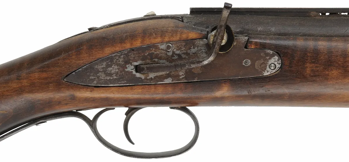 Muzzleloading Shotgun,
 12 gauge choked, 36" Melot barrel,
mule ear percussion lock, L&R trigger, iron trim, crude