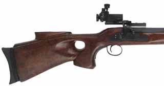 ModernTarget Rifle,
.48 caliber, 38-1/2" Goodoien barrel with false muzzle,
L&R percussion, walnut, iron, Anschutz sights, 
used, with repaired crack through the wrist