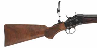 Remington No. 1 Rolling Block Rifle,
caliber .45-90, 30" round barrel, with original .45-70 barrel,
checkered walnut, pistol grip, Vernier tang & globe sight,
used, by Remington Custom Shop