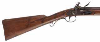 Flint Fowling Gun,
12 gauge, 39" octagon-to-round barrel,
Siler flint lock, walnut, iron trim,
used, by J.T. Phillips