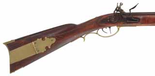 Pennsylvania Longrifle
.32 caliber, 44" straight octagon barrel,
maple, brass trim, small Siler flintlock,
single lever double set trigger, used, unsigned