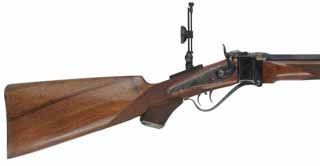 1877 Sharps Rifle,
caliber .45-70 Gov't, 30" barrel,
checkered walnut, M.V.A. globe and tang sight, 
used, by Axtell Rifle Co.