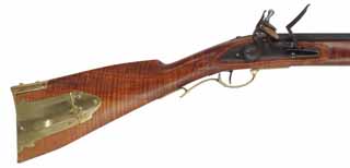 Colonial Longrifle,
.50 caliber, 44" swamped barrel, 
round faced flintlock, curly maple, polished brass, used