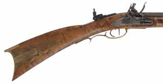 Pennsylvania Longrifle,
.50 caliber 42" barrel
hand made lock, curly maple, brass,
Lyman peep & globe sights, used, marked A.M. Osterman