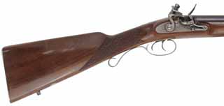 Double Shotgun,
20 gauge, 28" browned barrels,
flintlock, walnut, pressed checkering,
used, by Davide Pedersoli