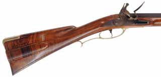 Colonial Longrifle,
.50 caliber, 43-1/2" swamped barrel, 
round faced flintlock, curly maple, brass, new