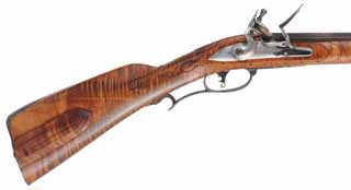 Virginia Longrifle,
.50 caliber, 44" swamped octagon barrel,
curly maple, iron furniture, sliding wooden patchbox, 
new, unfired, by D. Ricketts