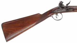 Antique Double Shotgun,
20 gauge 33-1/2" Damascus barrels,
walnut, iron trim, flintlocks marked Burgon