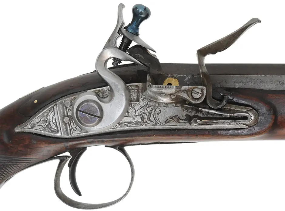 Antique Belt Pistol,
.60 caliber smoothbore, 9-1/4" barrel,
reconverted to flint lock, repaired walnut, iron trim
