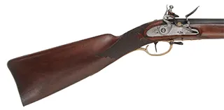 Antique European Fowling Gun,
.60 caliber smoothbore, 35-3/4" tapered octagon barrel, 
flintlock, checkered walnut, brass trim 