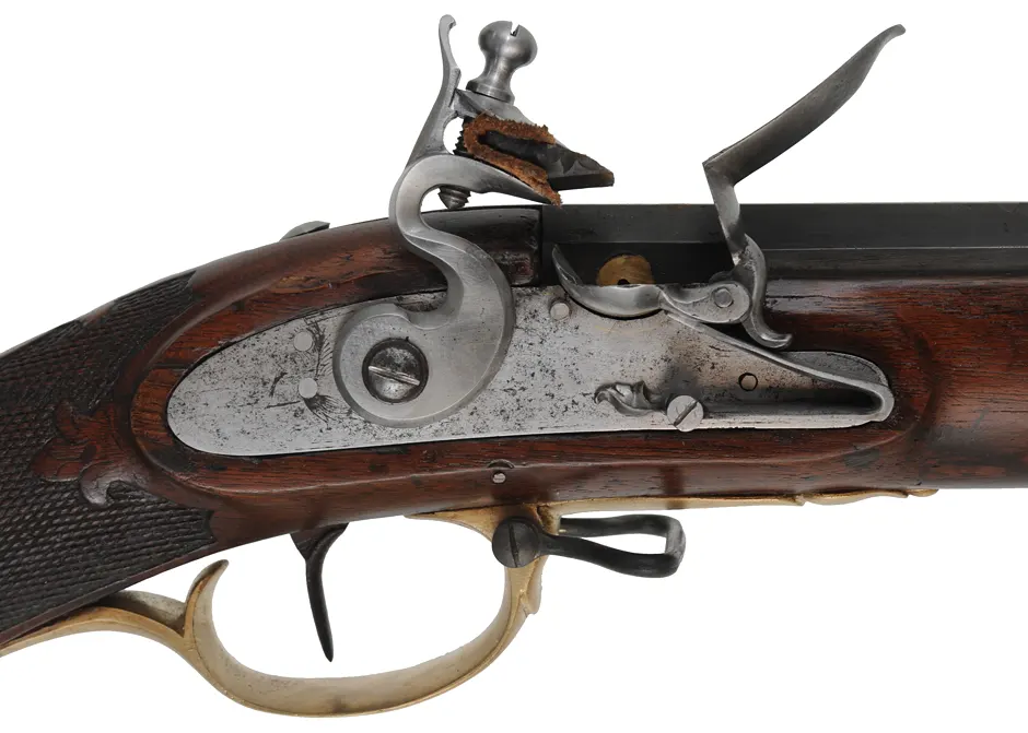 Antique European Fowling Gun,
.60 caliber smoothbore, 35-3/4" tapered octagon barrel, 
flintlock, checkered walnut, brass trim 