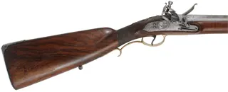Antique European Fowling Gun,
.59 caliber smoothbore, 33-3/4" swamped octagon barrel, 
reconverted flintlock, checkered walnut, bras & iron trim 