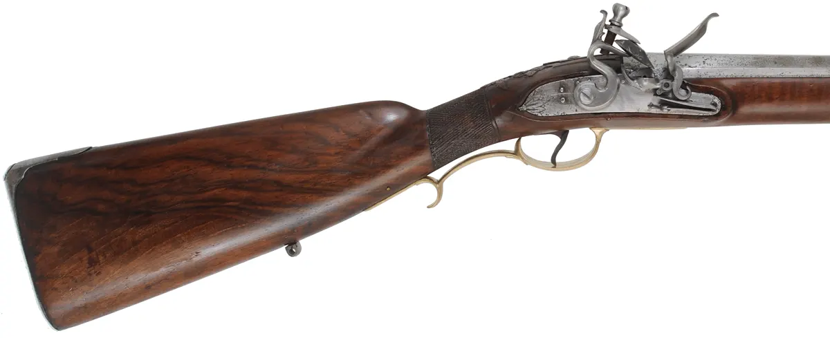 Antique European Fowling Gun,
.59 caliber smoothbore, 33-3/4" swamped octagon barrel,
reconverted flintlock, checkered walnut, bras & iron trim Antique European Fowling Gun,
.59 caliber smoothbore, 33-3/4" swamped octagon barrel,
reconverted flintlock, checkered walnut, bras & iron trim