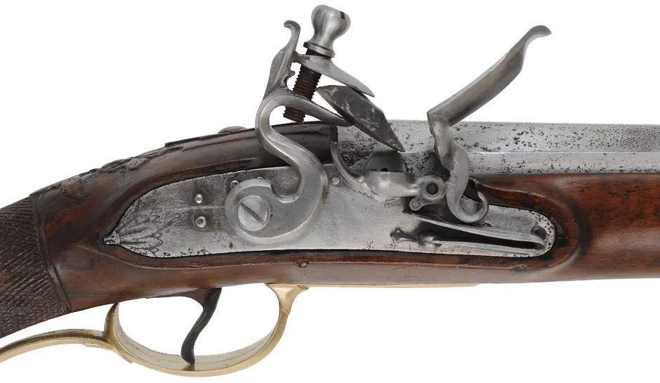 Antique European Fowling Gun,
.59 caliber smoothbore, 33-3/4" swamped octagon barrel,
reconverted flintlock, checkered walnut, bras & iron trim Antique European Fowling Gun,
.59 caliber smoothbore, 33-3/4" swamped octagon barrel,
reconverted flintlock, checkered walnut, bras & iron trim