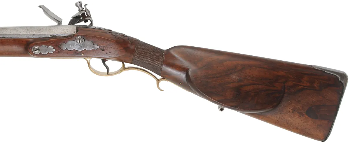 Antique European Fowling Gun,
.59 caliber smoothbore, 33-3/4" swamped octagon barrel,
reconverted flintlock, checkered walnut, bras & iron trim Antique European Fowling Gun,
.59 caliber smoothbore, 33-3/4" swamped octagon barrel,
reconverted flintlock, checkered walnut, bras & iron trim