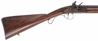 Fowler with Smooth and Rifled Barrels,
20 gauge, 35-1/2" octagon-to-round barrel,
.54 caliber, 33" octagon-to-round barrel,
L&R flint lock, walnut, iron trim, used