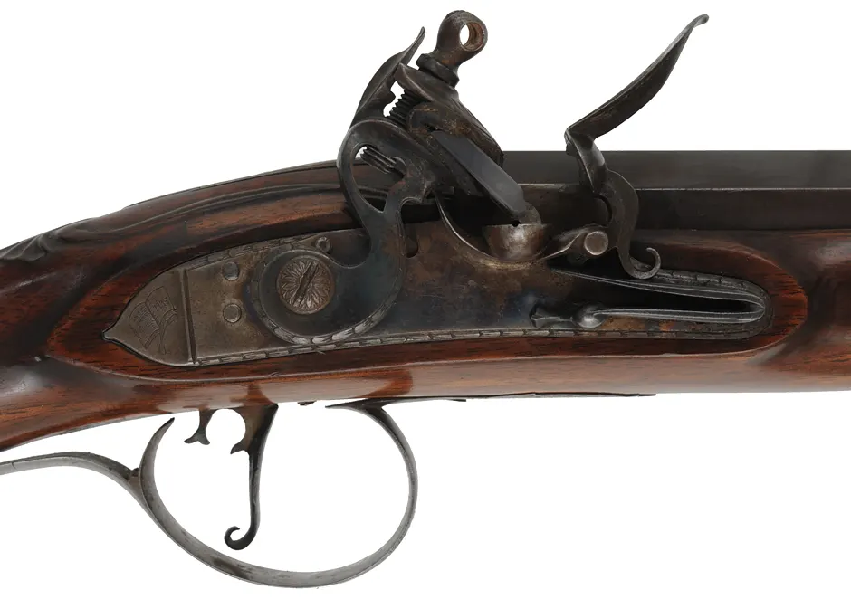 Fowler with Smooth and Rifled Barrels,
20 gauge, 35-1/2" octagon-to-round barrel,
.54 caliber, 33" octagon-to-round barrel,
L&R flint lock, walnut, iron trim, used