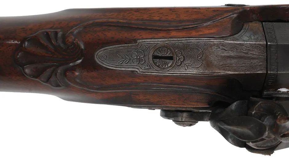 Fowler with Smooth and Rifled Barrels,
20 gauge, 35-1/2" octagon-to-round barrel,
.54 caliber, 33" octagon-to-round barrel,
L&R flint lock, walnut, iron trim, used