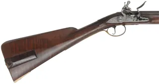 Early Southern Mountain Rifle,
.40 caliber 46" swamped barrel,
TRS flint lock, maple, brass trim, used