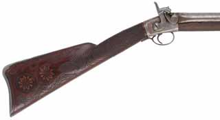 Antique Box Lock Shotgun,
24 gauge, 32" tapered round barrel,
percussion, walnut with carved decorations on stock
