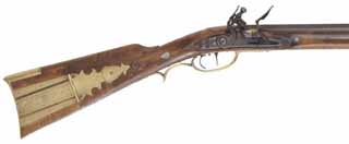 Pennsylvania Longrifle
.45 caliber, 41" straight octagon barrel,
maple, brass trim, Chambers lock,
used, signed by Leonard Meadows