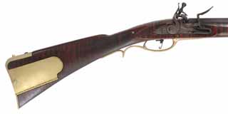 Bucks County Longrifle,
.50 caliber, 42" Colerain barrel,
L&R flint lock, curly maple, brass trim, used