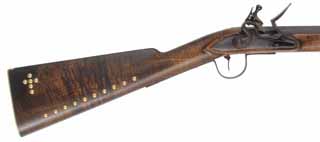 Northwest Trade Gun,
24 gauge, 36" tapered octagon-to-round barrel,
L&R flintlock, curly maple, brass tacks, 
new, unfired, by J.A. Wymore