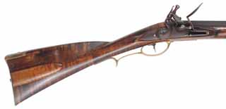 Virginia Valley Longrifle,
.45 caliber, 39-3/4" swamped barrel, 
round faced flintlock, curly maple, brass, used