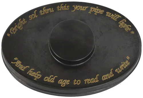 Tinder Box,
with burning glass lens,
3'' wide by 4-1/2'', black finish, engraved brass