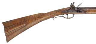 York County Longrifle, 
.40 caliber, 39-1/2" octagon-to-round barrel,
flintlock, maple, brass,
used, signed John Schippers