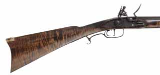 Tennessee Mountain Rifle,
 .36 caliber, 39" barrel,
Ketland flintlock, maple, limited iron trim, used