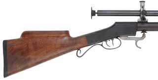 Underhammer Target Rifle
.45 caliber, 32" barrel with guide starter, 
walnut, globe & Unertl tube sight, with accessories, used