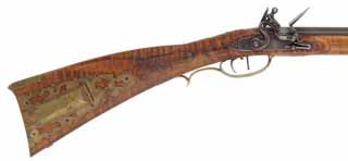 Berks County, Pennsylvania Longrifle
.45 caliber, 43-3/4" barrel,
Russ Hamm flintlock, curly maple, brass trim, engraved, 
used, signed by D. Herman