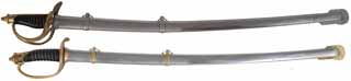 Pair of Cavalry Sabers & Scabbard,
both have heavy grinding marks on the blades, metal scabbards