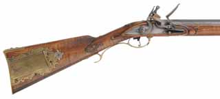 Early Virginia Longrifle,
.54 caliber, 42" swamped Rice barrel,
flint lock, curly maple, engraved brass trim,
near-new, by Robert Faddis