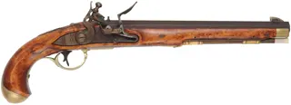 Kentucky Pistol
.50 caliber 10-1/2" tapered barrel,
small Siler flint lock, curly maple,
engraved brass trim, signed by R.W. Deitz