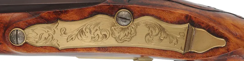 Kentucky Pistol
.50 caliber 10-1/2" tapered barrel,
small Siler flint lock, curly maple,
engraved brass trim, signed by R.W. Deitz Kentucky Pistol
.50 caliber 10-1/2" tapered barrel,
small Siler flint lock, curly maple,
engraved brass trim, signed by R.W. Deitz