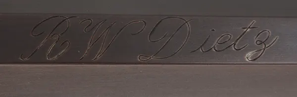 Kentucky Pistol
.50 caliber 10-1/2" tapered barrel,
small Siler flint lock, curly maple,
engraved brass trim, signed by R.W. Deitz Kentucky Pistol
.50 caliber 10-1/2" tapered barrel,
small Siler flint lock, curly maple,
engraved brass trim, signed by R.W. Deitz