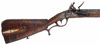 Jaeger Rifle,
.62 caliber, 33" octagon-to-round barrel,
flintlock, maple, brass, patina finished, 
used, by D. Minnich