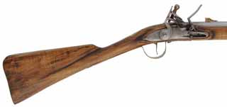 English Trade Gun, 
.56 caliber smoothbore, 30" octagon-to-round barrel,
R.E. Davis flint lock, maple, brass trim, used 