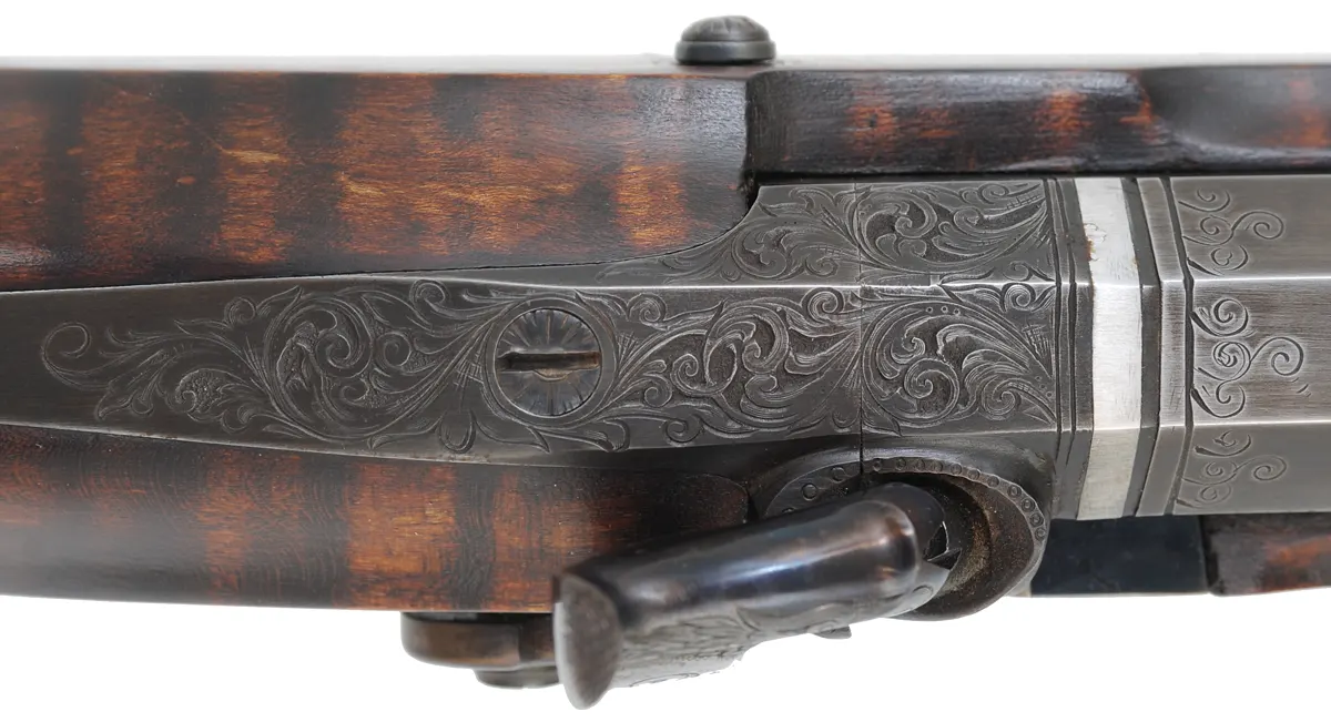 Hawken Rifle,
.50 caliber, W.M. Large 36" barrel,
percussion, walnut, engraved iron
used, signed by T. Wilkes Hawken Rifle,
.50 caliber, W.M. Large 36" barrel,
percussion, walnut, engraved iron
used, signed by T. Wilkes