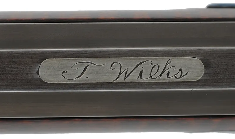 Hawken Rifle,
.50 caliber, W.M. Large 36" barrel,
percussion, walnut, engraved iron
used, signed by T. Wilkes Hawken Rifle,
.50 caliber, W.M. Large 36" barrel,
percussion, walnut, engraved iron
used, signed by T. Wilkes