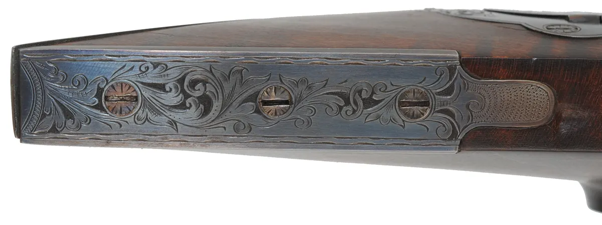 Hawken Rifle,
.50 caliber, W.M. Large 36" barrel,
percussion, walnut, engraved iron
used, signed by T. Wilkes Hawken Rifle,
.50 caliber, W.M. Large 36" barrel,
percussion, walnut, engraved iron
used, signed by T. Wilkes