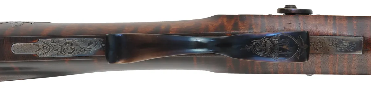 Hawken Rifle,
.50 caliber, W.M. Large 36" barrel,
percussion, walnut, engraved iron
used, signed by T. Wilkes Hawken Rifle,
.50 caliber, W.M. Large 36" barrel,
percussion, walnut, engraved iron
used, signed by T. Wilkes