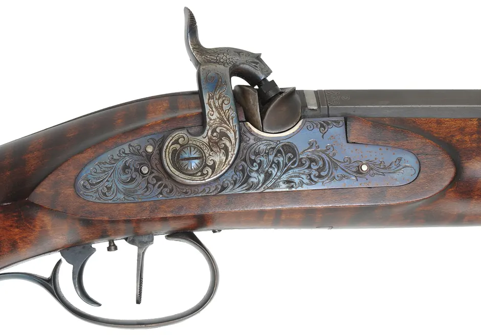 Hawken Rifle,
.50 caliber, W.M. Large 36" barrel,
percussion, walnut, engraved iron
used, signed by T. Wilkes Hawken Rifle,
.50 caliber, W.M. Large 36" barrel,
percussion, walnut, engraved iron
used, signed by T. Wilkes