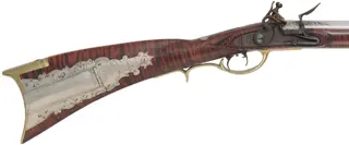 Lehigh Valley Longrifle,
.32 caliber, 33-1/4" straight octagon barrel,
curly maple, brass & nickel silver trim, small Siler flintlock, 
used, signed by L. Bryner