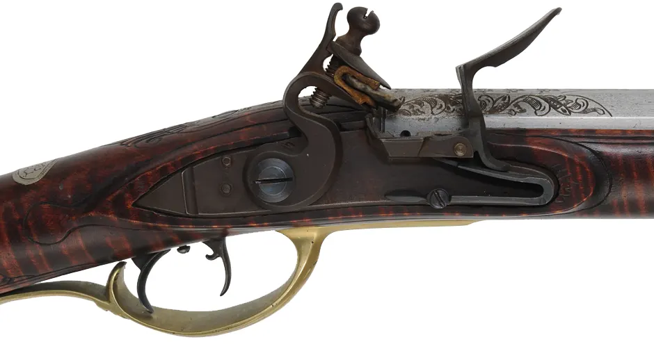 Lehigh Valley Longrifle,
.32 caliber, 33-1/4" straight octagon barrel,
curly maple, brass & nickel silver trim, small Siler flintlock, 
used, signed by L. Bryner