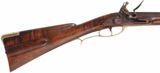 Colonial Longrifle,
.50 caliber, 43-1/2" swamped barrel, 
round faced flintlock, curly maple, polished brass, used